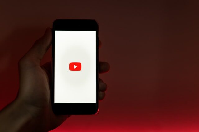 play button on phone screen about to play the best app explainer videos